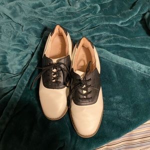 Black and white saddle shoes